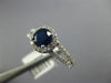 ESTATE 1.28CT DIAMOND & AAA SAPPHIRE 14KT WHITE GOLD ROUND HALO ENGAGEMENT RING
