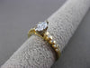 ESTATE .56CT ROUND & MARQUISE DIAMOND 14KT YELLOW GOLD ENGAGEMENT RING #16107