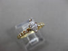 ESTATE .56CT ROUND & MARQUISE DIAMOND 14KT YELLOW GOLD ENGAGEMENT RING #16107