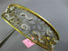 ESTATE WIDE .65CT DIAMOND 14KT TWO TONE GOLD OPEN FILIGREE WAVE BANGLE BRACELET