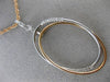 ESTATE .24CT DIAMOND 14KT WHITE & ROSE GOLD 3D OVAL ETOILE FLOATING PENDANT