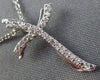 ESTATE SMALL .12CT DIAMOND 14KT WHITE GOLD 3D PAVE SWIRL CROSS FLOATING PENDANT