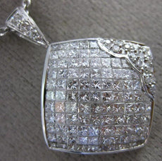 1.82CT ROUND & PRINCESS DIAMOND 18KT WHITE GOLD INVISIBLE SQUARE FLOWER PENDANT