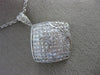 1.82CT ROUND & PRINCESS DIAMOND 18KT WHITE GOLD INVISIBLE SQUARE FLOWER PENDANT