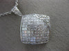 1.82CT ROUND & PRINCESS DIAMOND 18KT WHITE GOLD INVISIBLE SQUARE FLOWER PENDANT