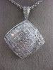 1.82CT ROUND & PRINCESS DIAMOND 18KT WHITE GOLD INVISIBLE SQUARE FLOWER PENDANT