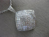 1.82CT ROUND & PRINCESS DIAMOND 18KT WHITE GOLD INVISIBLE SQUARE FLOWER PENDANT