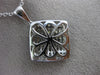 1.82CT ROUND & PRINCESS DIAMOND 18KT WHITE GOLD INVISIBLE SQUARE FLOWER PENDANT