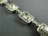 ESTATE WIDE 6.36CT WHITE & PINK DIAMOND 18KT WHITE GOLD FILIGREE TENNIS BRACELET