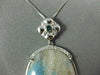 LARGE .63CT WHITE & BLUE DIAMOND & AAA JASPAR 14K WHITE GOLD OVAL FLOWER PENDANT