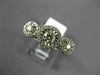 ESTATE WIDE .61CT DIAMOND 14KT WHITE GOLD 3 STONE HALO PAST PRESENT FUTURE RING