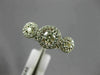 ESTATE WIDE .61CT DIAMOND 14KT WHITE GOLD 3 STONE HALO PAST PRESENT FUTURE RING