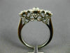ESTATE WIDE .61CT DIAMOND 14KT WHITE GOLD 3 STONE HALO PAST PRESENT FUTURE RING