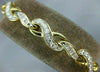 ESTATE WIDE AND LONG 2.0CT DIAMOND 14KT YELLOW GOLD 3D INFINITY TENNIS BRACELET
