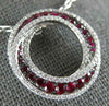 LARGE 1.25CT DIAMOND & AAA RUBY 18KT WHITE GOLD 3D CIRCULAR INTERTWINING PENDANT