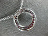 LARGE 1.25CT DIAMOND & AAA RUBY 18KT WHITE GOLD 3D CIRCULAR INTERTWINING PENDANT