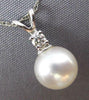 ESTATE .05CT DIAMOND & AAA SOUTH SEA PEARL 14KT WHITE GOLD 3D SOLITAIRE PENDANT