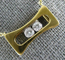 ESTATE .11CT DIAMOND 18KT 2 TONE GOLD 3D 2 STONE ETOILE FLOATING LOVE PENDANT