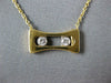 ESTATE .11CT DIAMOND 18KT 2 TONE GOLD 3D 2 STONE ETOILE FLOATING LOVE PENDANT