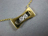 ESTATE .11CT DIAMOND 18KT 2 TONE GOLD 3D 2 STONE ETOILE FLOATING LOVE PENDANT