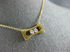 ESTATE .11CT DIAMOND 18KT 2 TONE GOLD 3D 2 STONE ETOILE FLOATING LOVE PENDANT
