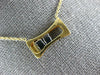 ESTATE .11CT DIAMOND 18KT 2 TONE GOLD 3D 2 STONE ETOILE FLOATING LOVE PENDANT