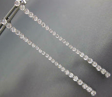 ESTATE .79CT DIAMOND 18KT WHITE GOLD ROUND BEZEL ELONGATED LONG HANGING EARRINGS