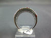 ESTATE WIDE 1.59CT DIAMOND & AAA RUBY 18KT WHITE GOLD MULTI ROW TRIANGULAR RING