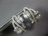 ESTATE .93CT DIAMOND 18KT WHITE GOLD ROUND & BAGUETTE INFINITY CLIP ON EARRINGS
