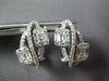 ESTATE .93CT DIAMOND 18KT WHITE GOLD ROUND & BAGUETTE INFINITY CLIP ON EARRINGS