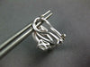 ESTATE .93CT DIAMOND 18KT WHITE GOLD ROUND & BAGUETTE INFINITY CLIP ON EARRINGS
