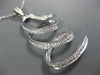ESTATE LARGE .93CT DIAMOND 18KT WHITE GOLD 3D LOVE KNOT SIGNATURE FUN PENDANT
