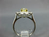 GIA WIDE 2.1CT WHITE & FANCY YELLOW DIAMOND PLATINUM OVAL FLOWER ENGAGEMENT RING