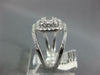 LARGE .75CT DIAMOND 14KT WHITE GOLD ROUND & BAGUETTE SQUARE HALO ENGAGEMENT RING