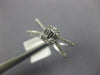 .37CT DIAMOND 14KT WHITE GOLD 3D ROUND & BAGUETTE CLUSTER SQUARE X INFINITY RING