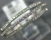 ESTATE .20CT DIAMOND 18KT WHITE GOLD CLASSIC OPEN THREE ROW FUN RING