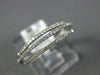 ESTATE .20CT DIAMOND 18KT WHITE GOLD CLASSIC OPEN THREE ROW FUN RING