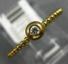 ESTATE .05CT DIAMOND 14KT ROSE GOLD CLASSIC SOLITAIRE ETOILE BEZEL BEADED RING