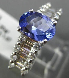 1.67CT ROUND & BAGUETTE DIAMOND & TANZANITE 18KT WHITE GOLD OVAL ENGAGEMENT RING