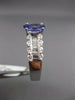 1.67CT ROUND & BAGUETTE DIAMOND & TANZANITE 18KT WHITE GOLD OVAL ENGAGEMENT RING