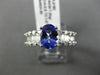 1.67CT ROUND & BAGUETTE DIAMOND & TANZANITE 18KT WHITE GOLD OVAL ENGAGEMENT RING