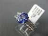 1.67CT ROUND & BAGUETTE DIAMOND & TANZANITE 18KT WHITE GOLD OVAL ENGAGEMENT RING