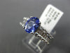 1.67CT ROUND & BAGUETTE DIAMOND & TANZANITE 18KT WHITE GOLD OVAL ENGAGEMENT RING