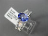 1.67CT ROUND & BAGUETTE DIAMOND & TANZANITE 18KT WHITE GOLD OVAL ENGAGEMENT RING