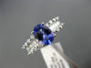 1.67CT ROUND & BAGUETTE DIAMOND & TANZANITE 18KT WHITE GOLD OVAL ENGAGEMENT RING