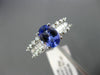 1.67CT ROUND & BAGUETTE DIAMOND & TANZANITE 18KT WHITE GOLD OVAL ENGAGEMENT RING