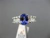 1.67CT ROUND & BAGUETTE DIAMOND & TANZANITE 18KT WHITE GOLD OVAL ENGAGEMENT RING