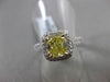 ESTATE 2.26CTW GIA FANCY YELLOW DIAMOND 18KT WHITE GOLD HALO ENGAGEMENT RING