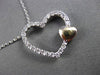 ESTATE .25CT DIAMOND 14KT TWO TONE GOLD FLOATING DOUBLE HEART PENDANT & CHAIN