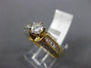 ESTATE 1.20CT ROUND & BAGUETTE DIAMOND 14KT YELLOW GOLD CLASSIC ENGAGEMENT RING